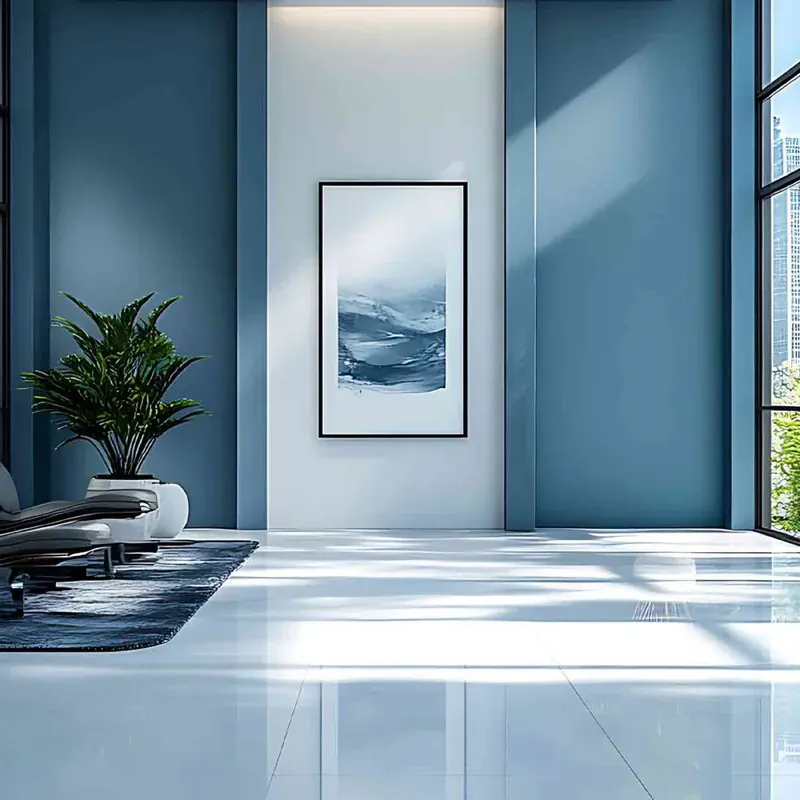 Office lobby in Waltham MA with repainted slate blue walls and a polished white floor