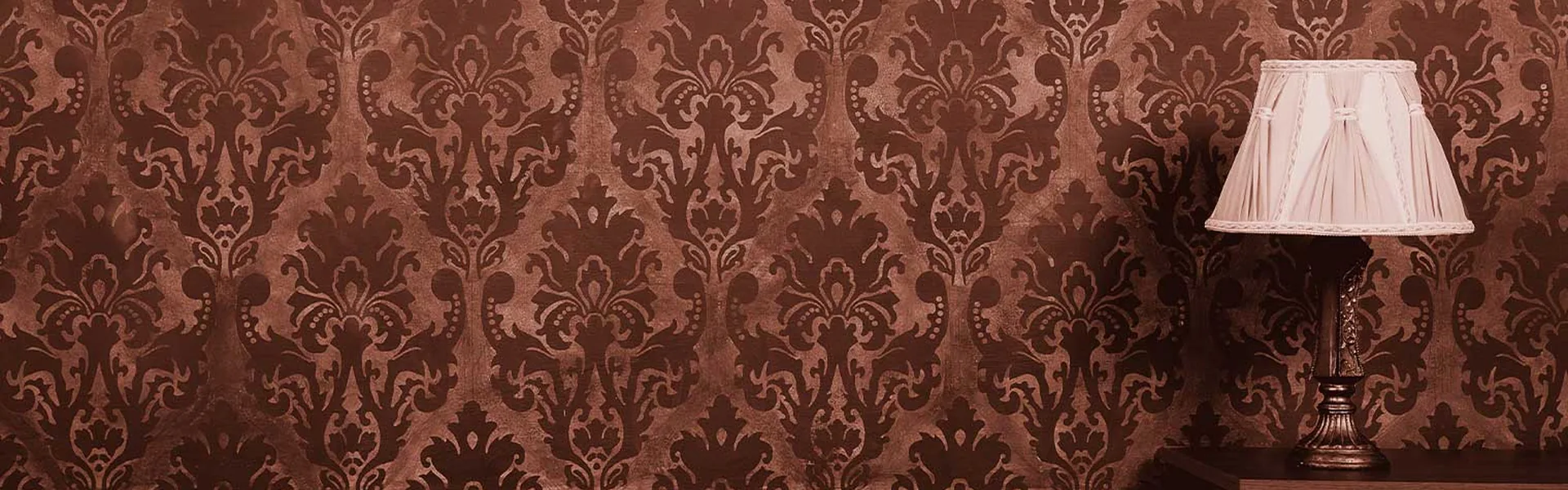 Richly finished wall and lamp in a MetroWest Massachusetts home, the kind of detail homeowners ask about